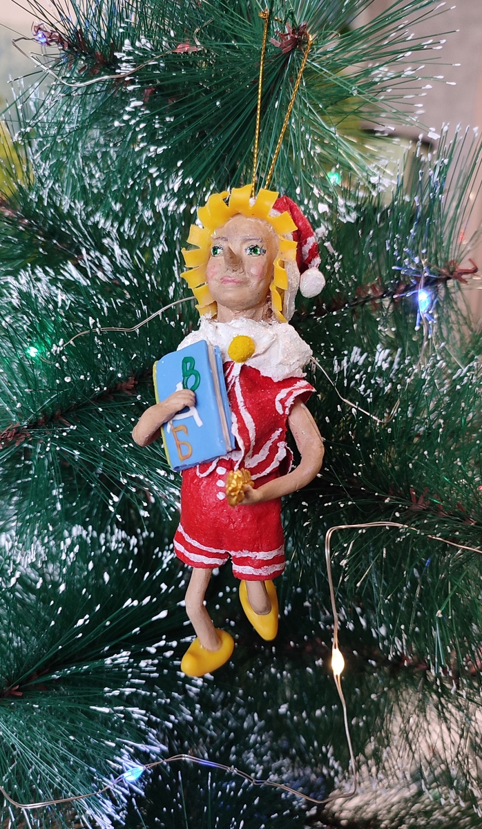 Буратино с азбукой.   ©Рукотворчество КЕА. DOES  KEA