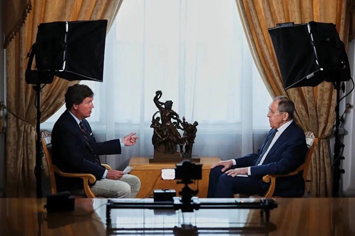   Такер Карлсон и Сергей Лавров.