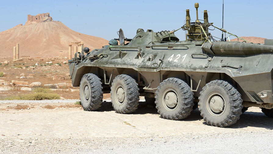    Российский бронетранспортер БТР-82А на фоне древнейшей крепости Калаат ибн Маан / Михаил Ходаренок/«Газета.Ru»