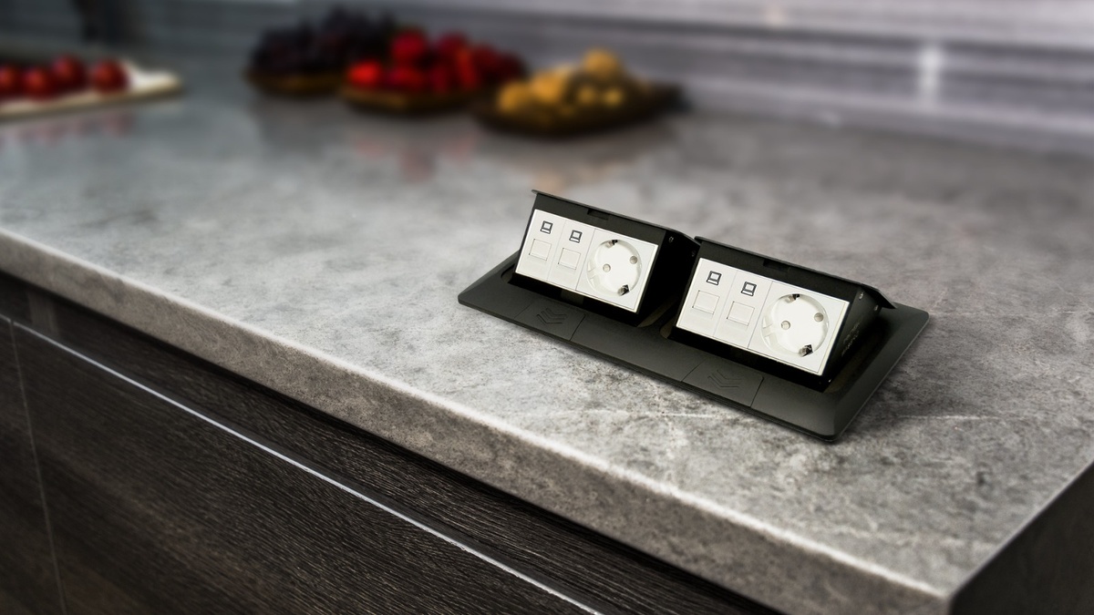 Лючок для установки в столешницу. Фото с сайта Donolux.ru