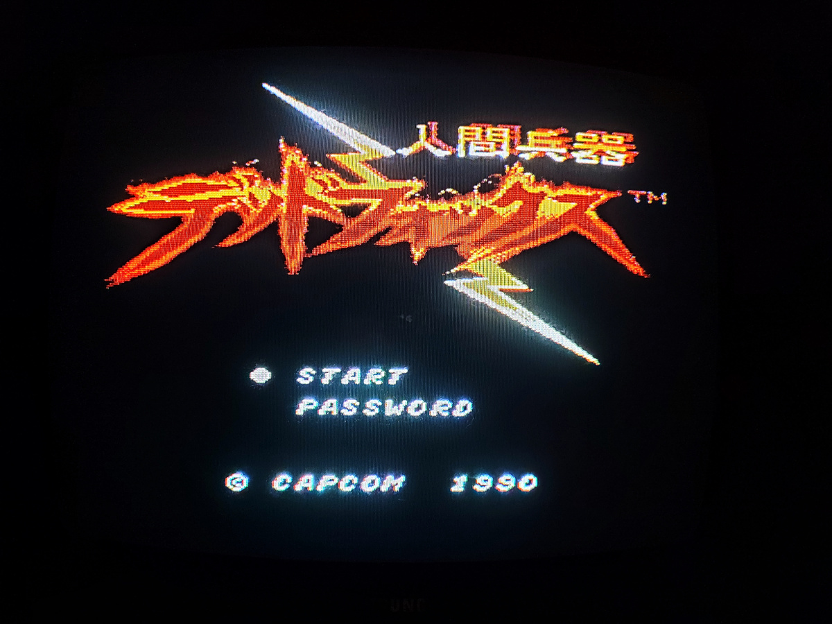 Фото сделаны мной. На фото игра "Dead fox". Оригинал игры "Code Name: Viper" был разработан  Arc System Works и издан  Capcom в 1990,.г. для NES. Фото демонстрирует начальную заставку игры, а так же общий визуальный фон игры. Подробнее об этом рассказано в статье. Все материалы принадлежат правообладателям и размещены исключительно в информационных целях.