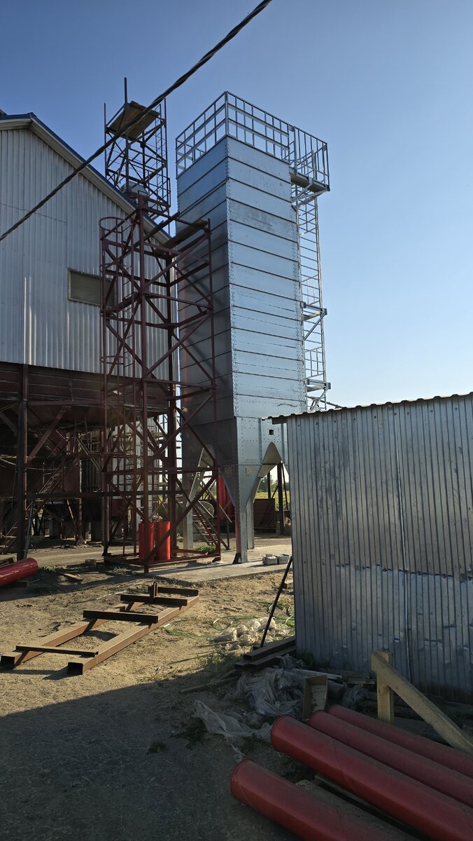 Обвязка зернотранспортом (нориями) колонны охлаждения RIR