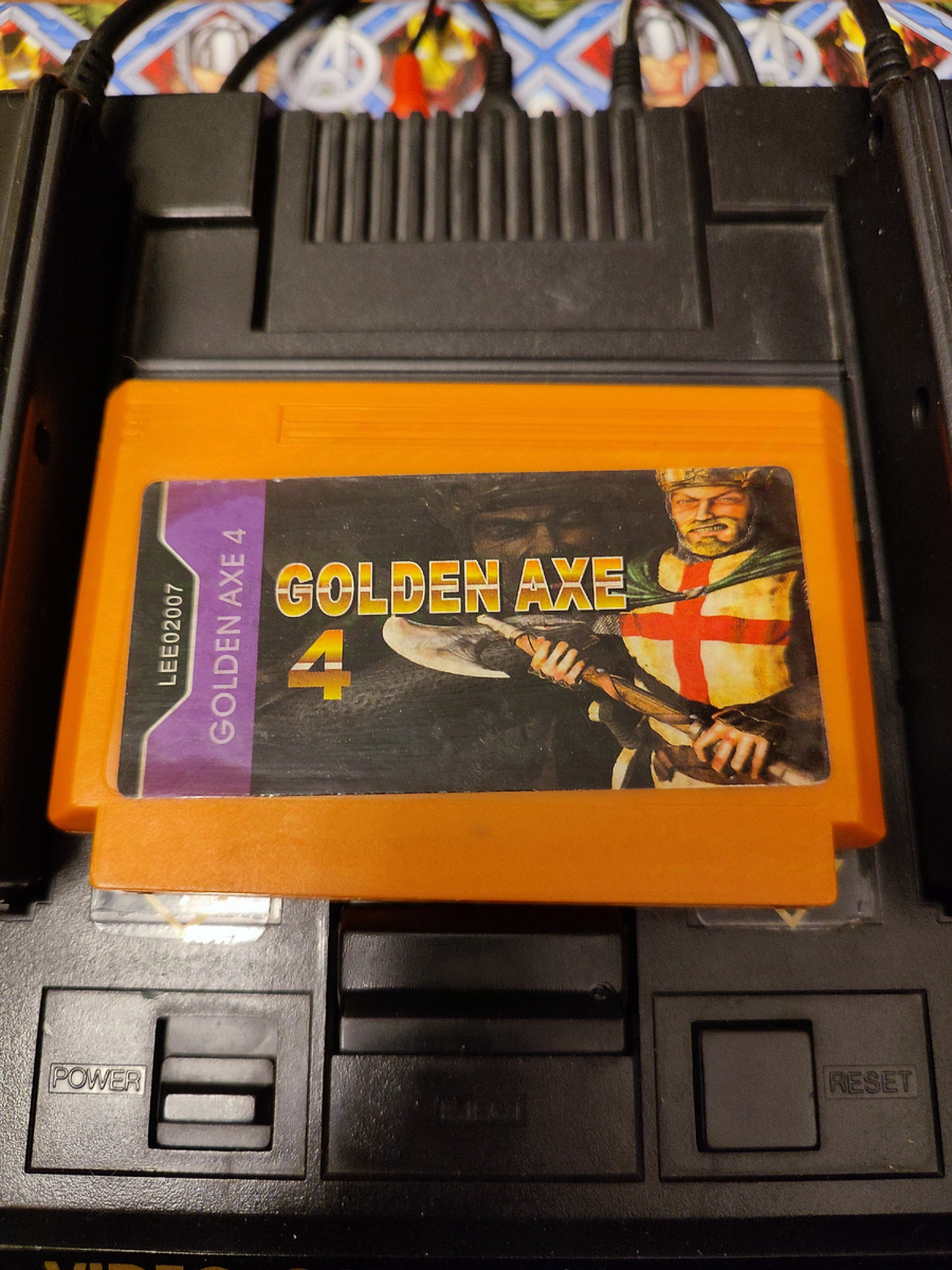 Фото сделаны мной. На фото игра "Golden Axe 4". Оригинал игры "Astyanax" был разработан Aicom и издан Jaleco в 1989г. для аркадных автоматов Jaleco. Директор, продюсер и дизайнер Токухиро Такемори. Фото демонстрирует начальную заставку игры, а так же общий визуальный фон игры. Подробнее об этом рассказано в статье. Все материалы принадлежат правообладателям и размещены исключительно в информационных целях.