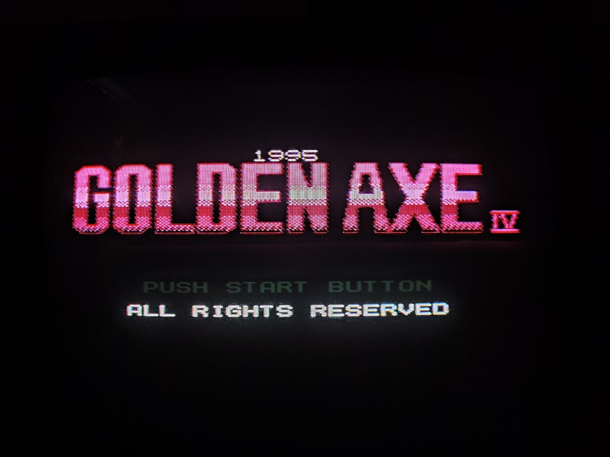 Фото сделаны мной. На фото игра "Golden Axe 4". Оригинал игры "Astyanax" был разработан Aicom и издан Jaleco в 1989г. для аркадных автоматов Jaleco. Директор, продюсер и дизайнер Токухиро Такемори. Фото демонстрирует начальную заставку игры, а так же общий визуальный фон игры. Подробнее об этом рассказано в статье. Все материалы принадлежат правообладателям и размещены исключительно в информационных целях.