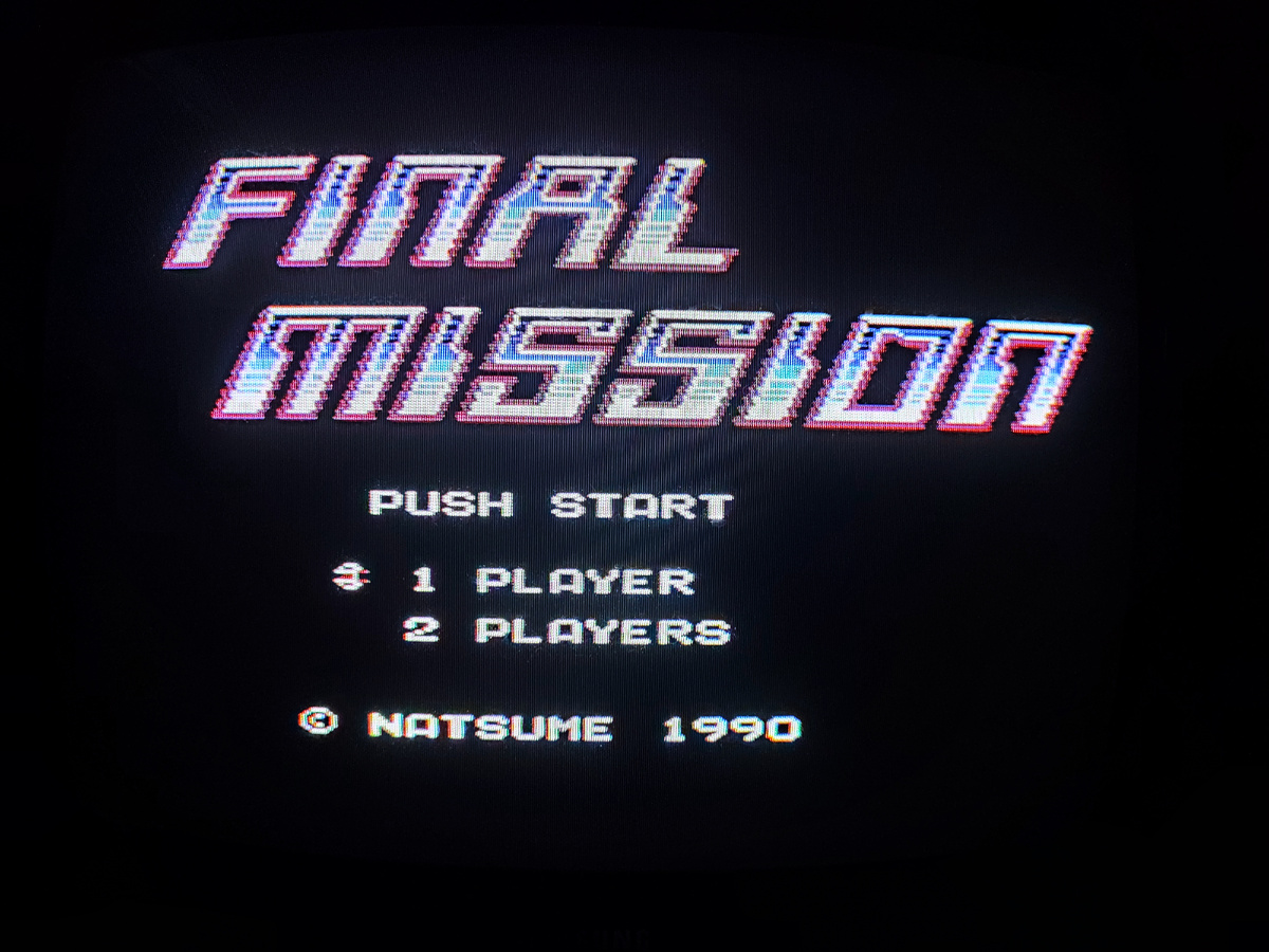 Фото сделаны мной. На фото игра "Final Mission". Оригинал игры "SCAT: Special Cybernetic Attack" был разработан Natsume Co и издан Natsume Co., Acclaim Entertainment, Infogrames в 1990г. для NES. Фото демонстрирует начальную заставку игры, а так же общий визуальный фон игры. Подробнее об этом рассказано в статье. Все материалы принадлежат правообладателям и размещены исключительно в информационных целях.