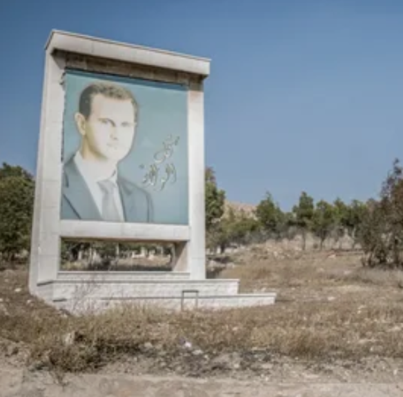 Портрет Башара Асада в Сирии.