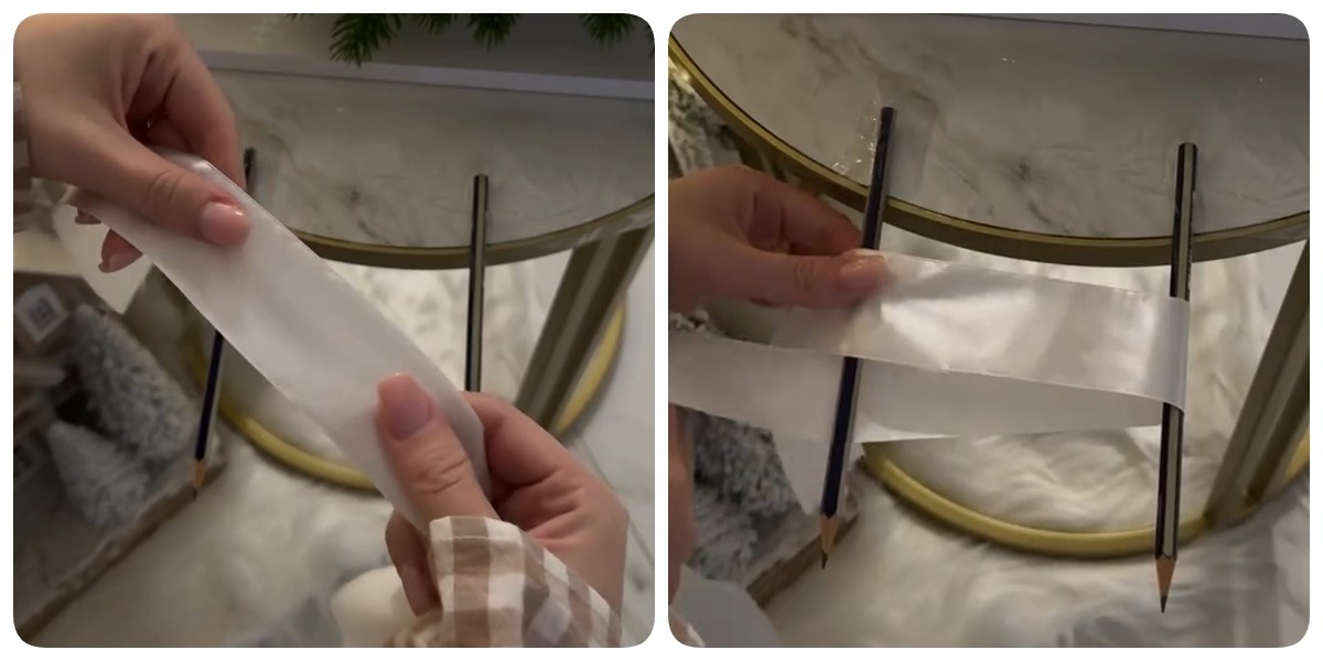 К краю стола скотчем прикрепляем пару карандашей на расстоянии 10-15 см друг от друга и начинаем обматывать ленточку вокруг них.