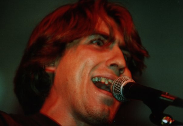 Антон "Кузя" Полянский (1974-2000), гр. СНЕГ, Новосибирск. Фотограф Евгений Иванов. Фото со страницы в ВК 
"Кузя (Антон Полянский)"  