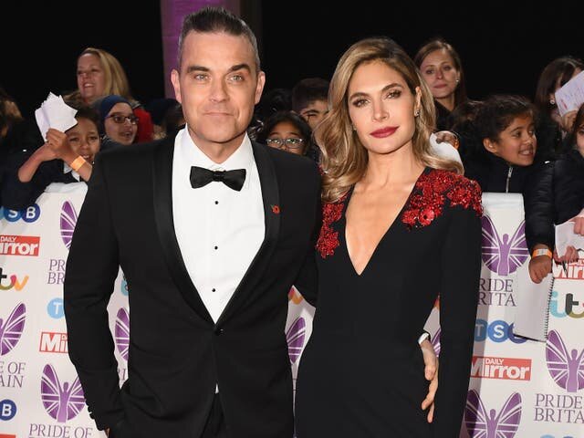 Фотография: Robbie and Ayda are currently battling it out on The X Factor (Image: Jeff Spicer/Getty Images)