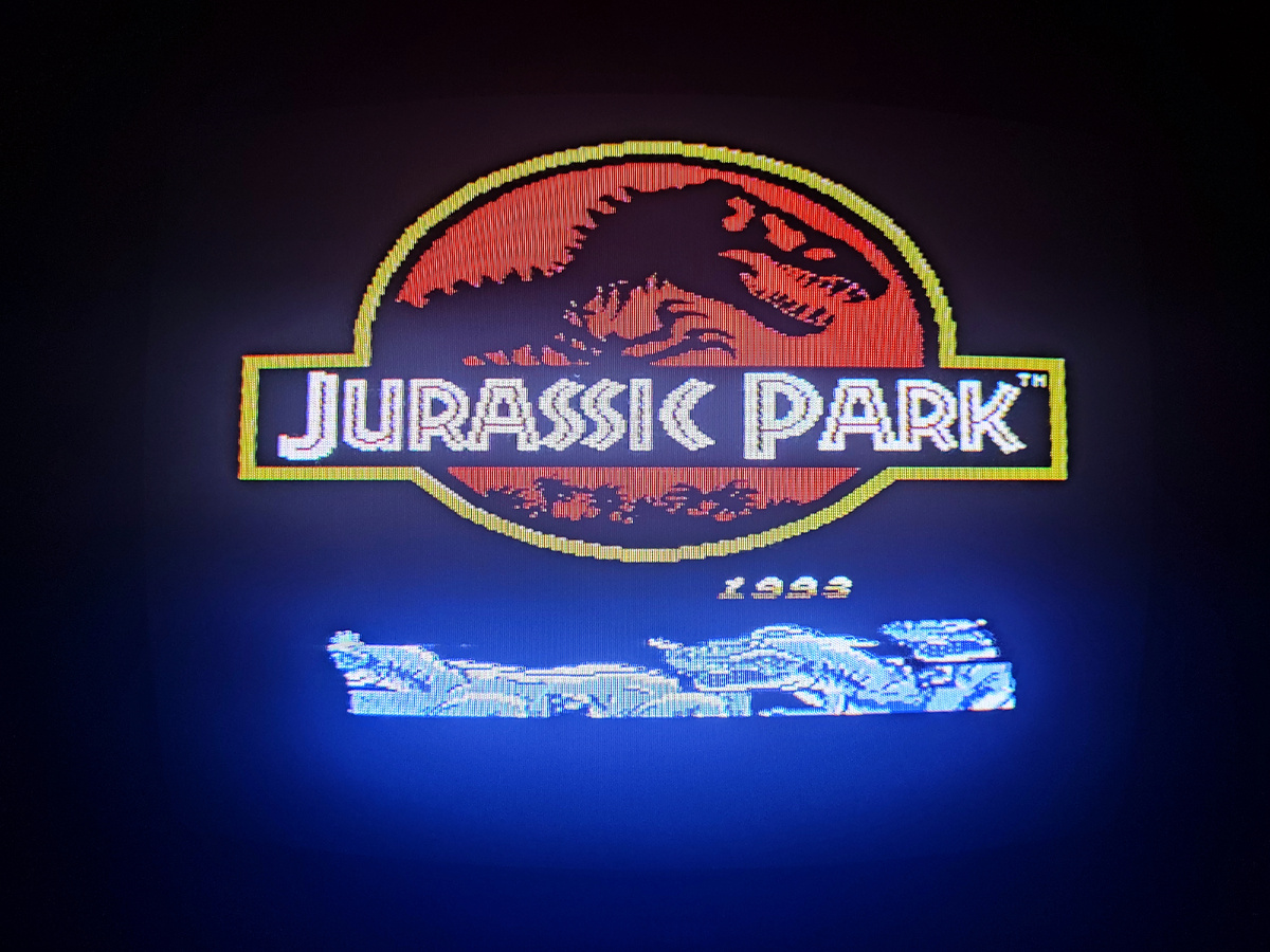 Фото сделаны мной. На фото игра "The Lost World". Оригинал игры "Jurassic Park" был разработан разработан и издан Ocean в 1993,.г. для  Game Boy, NES. Фото демонстрирует начальную заставку игры, а так же общий визуальный фон игры. Подробнее об этом рассказано в статье. Все материалы принадлежат правообладателям и размещены исключительно в информационных целях.