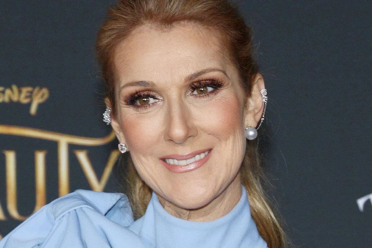     Неизлечимо больная Селин Дион снялась в красном платье и сапогах-петухах