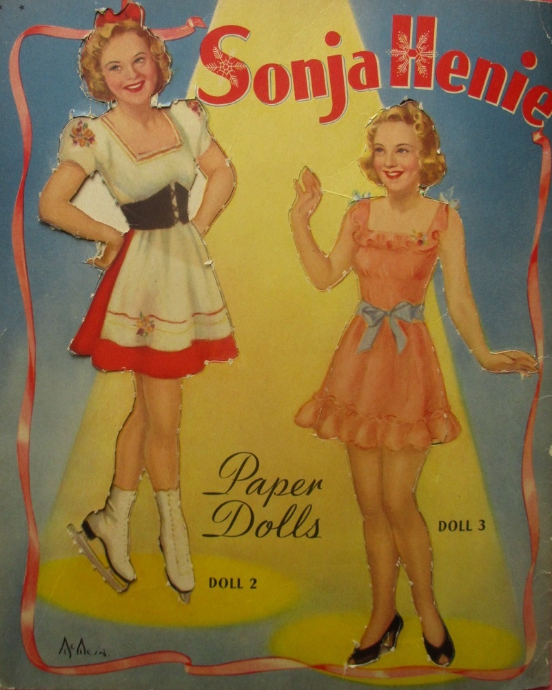 Задняя сторона обложки набора и вторая и третья куклы.