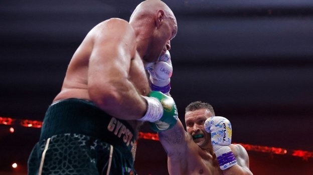    Тайсон Фьюри и Александр Усик. Reuters