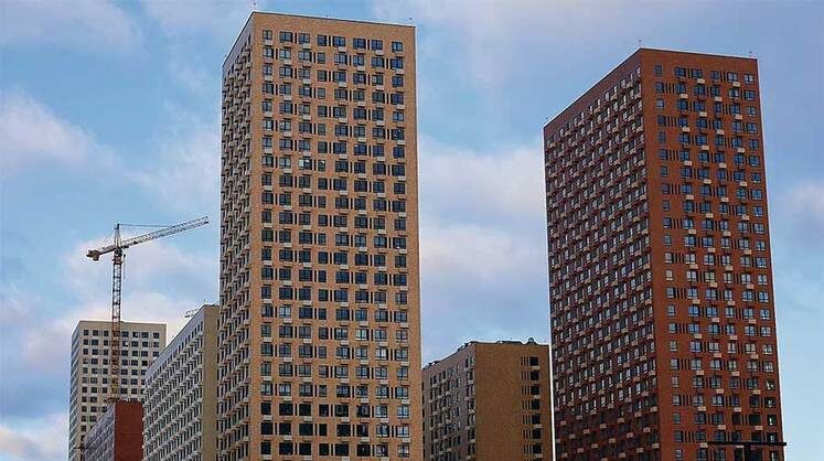    ОЛЕГ ЕЛКОВ/ТАСС Объемы ввода многоквартирного жилья в прошлом году были на уровне 2015 года