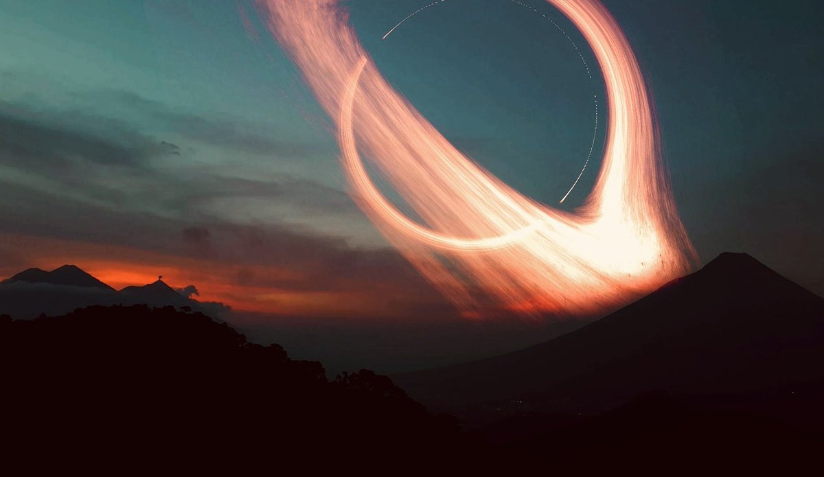 Вид сверхмассивной черной дыры с поверхности бланеты в представлении художника / © x.com/FarLife1