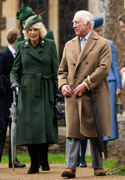 SANDRINGHAM, NORFOLK - DECEMBER 25: Queen Camilla and King Charles III attend the Christmas Morning Service at Sandringham Church on December 25, 2024 in Sandringham, Norfolk. (Photo by Samir Hussein/WireImage)