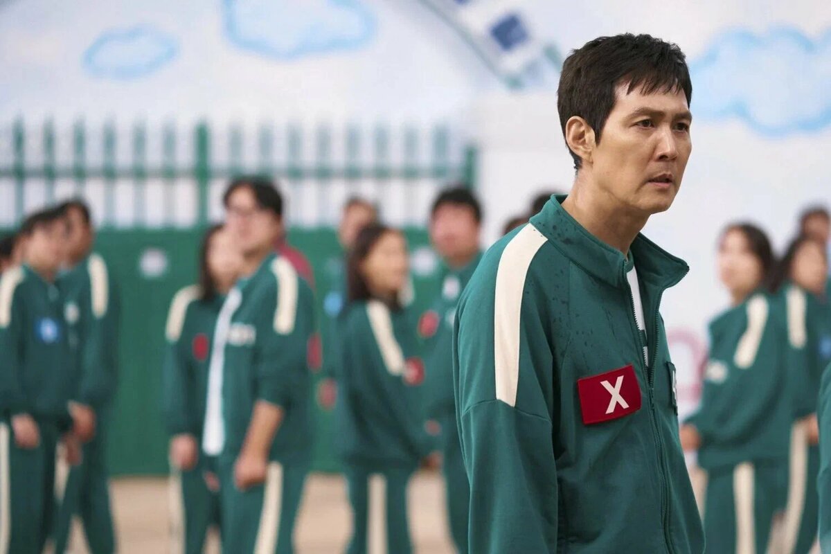    Кадр из сериала «Игра в кальмара»Кинопоиск