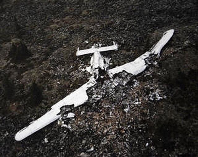    A 1943 photo shows the crash site of a B-24 Liberator, which went down in the Alaskan wilderness. The remains of 2nd Lt. Harold E. Hoskin, a World War II Army Air Force member, were recovered from the crash site in August 2006 and identified in April 2007. Lieutenant Hoskin's remains were interred Sept. 7 at Arlington National Cemetery in Virginia( Courtesy photo) Василий Соколов