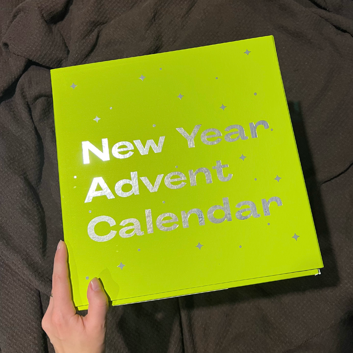 В прошлом году календарь был в виде ёлочки, теперь обычная коробка