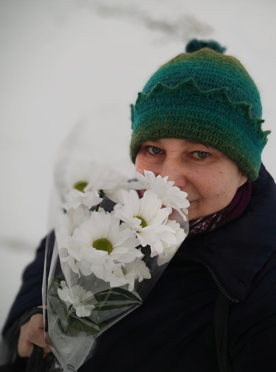 31 декабря. С букетом по-зимнему белых цветов отправляюсь в гости