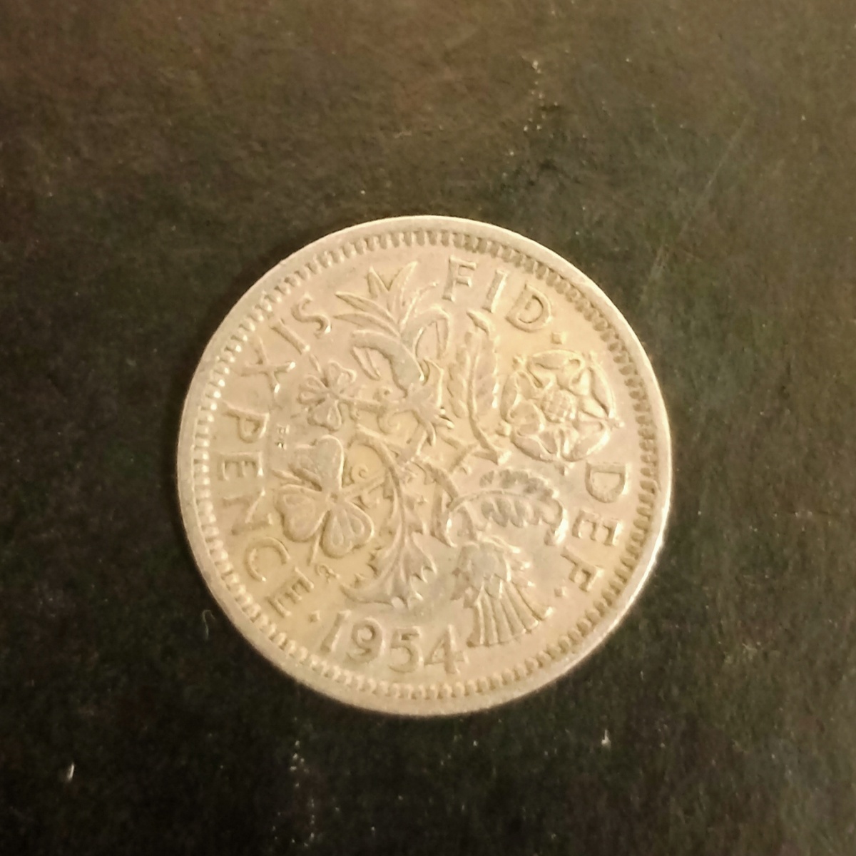 Реверс монеты 6 пенсов 1954г 