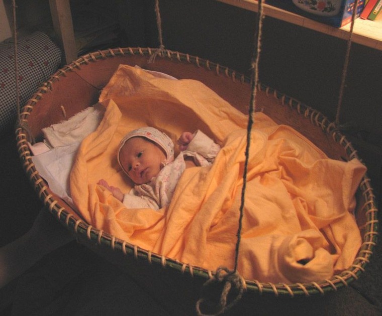 ребенок в колыбели