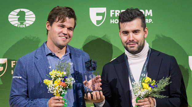    Магнус Карлсен и Ян Непомнящий.FIDE