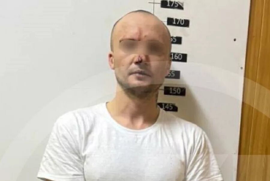 Задержанный в полиции.
