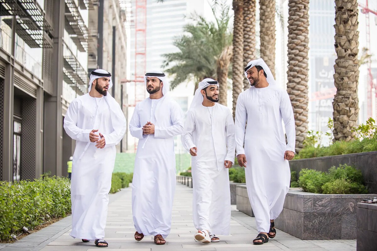 https://admin.expatica.com/ae/wp-content/uploads/sites/15/2023/11/emirati-businessmen-walking.jpg
