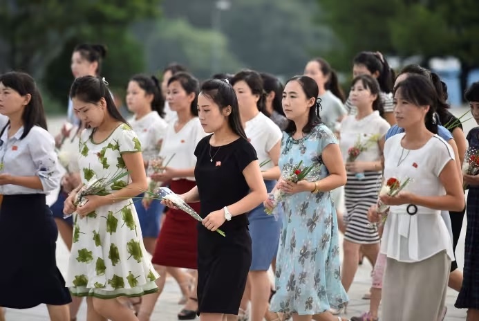 Женщины в Северной Корее. Источник: kim won jin/Agence France-Presse/Getty Images