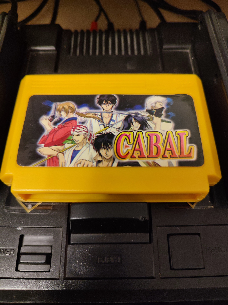 Фото сделаны мной. На фото игра "Cabal". Оригинал игры "Cabal" был разработан  TAD Corporation и издан  Taito, Fabtek,  Capcom в 1988г. для платформ Arcade, Amiga, Amstrad CPC, C64, ZX Spectrum, MS-DOS, NES. Фото демонстрирует начальную заставку игры, а так же общий визуальный фон игры. Подробнее об этом рассказано в статье. Все материалы принадлежат правообладателям и размещены исключительно в информационных целях.