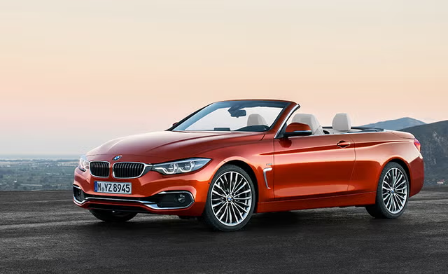 BMW 4-Series 430i Convertible. На фото: автомобиль образца 2019 года.