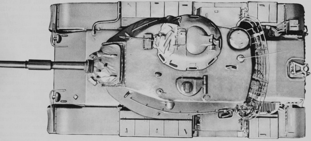 Вид сверху. В крыше башни оборудована командирская башенка кругового вращения с люком командира ( по правому борту) и люк заряжающего ( по левому борту). В кормовой части башни по правому борту- круглый колпак вентилятора. 