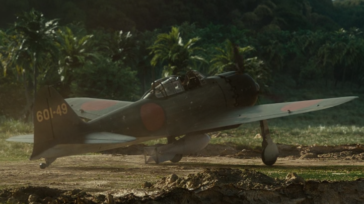 A6M5 с номером 601-49, хорошо видна 250-кг бомба.