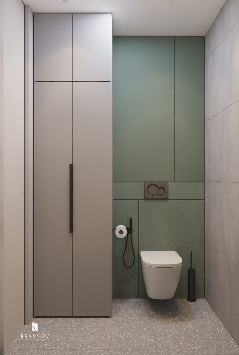 
В этом проекте стены выполнены из керамогранита с имитацией бетона, а пол покрыт плиткой, напоминающей текстуру камня. Эти материалы объединены одним цветом, таким образом, визуально увеличивают пространство.  Общий нейтральный фон разбавляет и освежает глубокий зеленый цвет мебели и стеновых панелей.

В этом проекте стены выполнены из керамогранита с имитацией бетона, а пол покрыт плиткой, напоминающей текстуру камня. Эти материалы объединены одним цветом, таким образом, визуально увеличивают пространство.  Общий нейтральный фон разбавляет и освежает глубокий зеленый цвет мебели и стеновых панелей