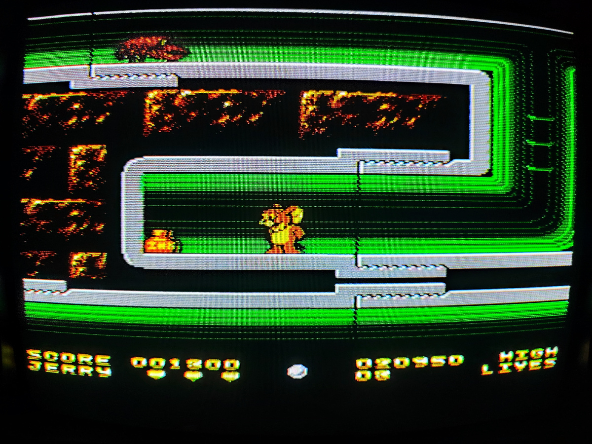 Фото сделаны мной. На фото игра "Tom & Jerry and Tuffy". Оригинал игры "Tom & Jerry: The Ultimate Game of Cat and Mouse!" был разработан Software Creations и издан Hi-Tech Expressions, Altron в 1991г. для NES. Продюсер и геймдизайнер Джон Пикфорд, программист Пол Мюррей. Фото демонстрирует начальную заставку игры, а так же общий визуальный фон игры. Подробнее об этом рассказано в статье. Все материалы принадлежат правообладателям и размещены исключительно в информационных целях.