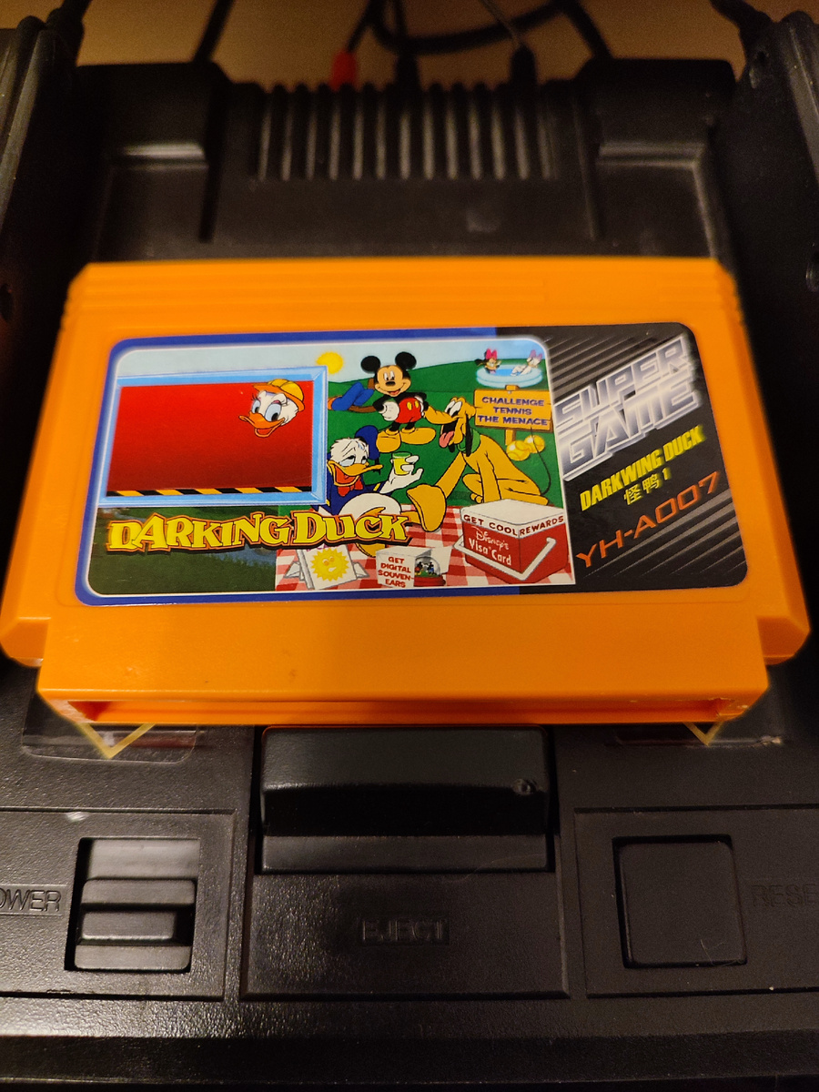 Фото сделаны мной. На фото игра "Disneyland 2". Оригинал игры "Doki! Doki! Yūenchi: Crazy Land Daisakusen" был разработан KID и издан VAP, American Softworks в 1991г. для NES. Дизайнер Кунихару Хосода, программист Норихиса Кавамото. Фото демонстрирует начальную заставку игры, а так же общий визуальный фон игры. Подробнее об этом рассказано в статье. Все материалы принадлежат правообладателям и размещены исключительно в информационных целях.