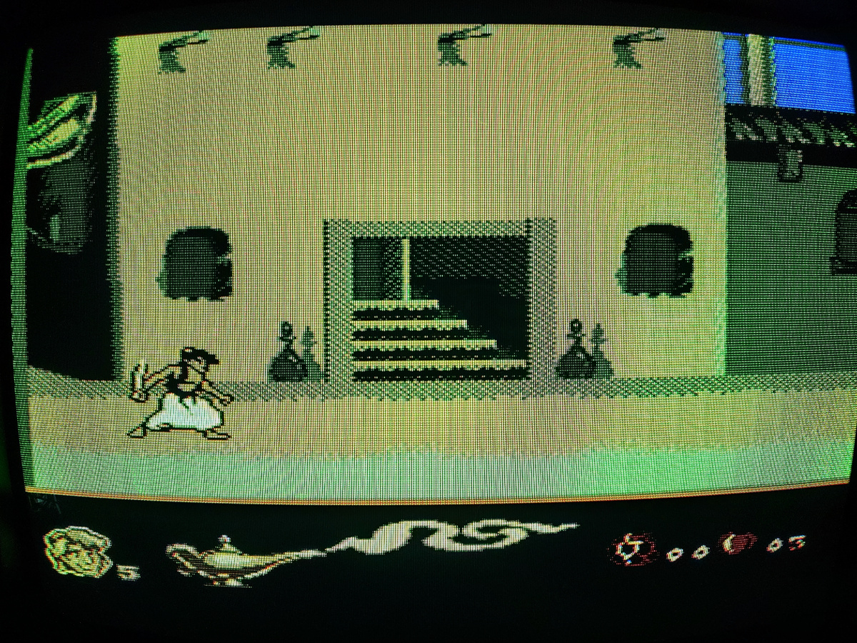 Фото сделаны мной. На фото игра "Супер Аладдин. Оригинал игры "Disney's Aladdin" был разработан Virgin Games и издан Sega в 1993г. для Sega Genesis. Директор и программист Дэвид Перри, дизайнеры Дэвид Бишоп, Билл Андерсон, Том Танака, Сет Мендельсон. Фото демонстрирует начальную заставку игры, а так же общий визуальный фон игры. Подробнее об этом рассказано в статье. Все материалы принадлежат правообладателям и размещены исключительно в информационных целях.