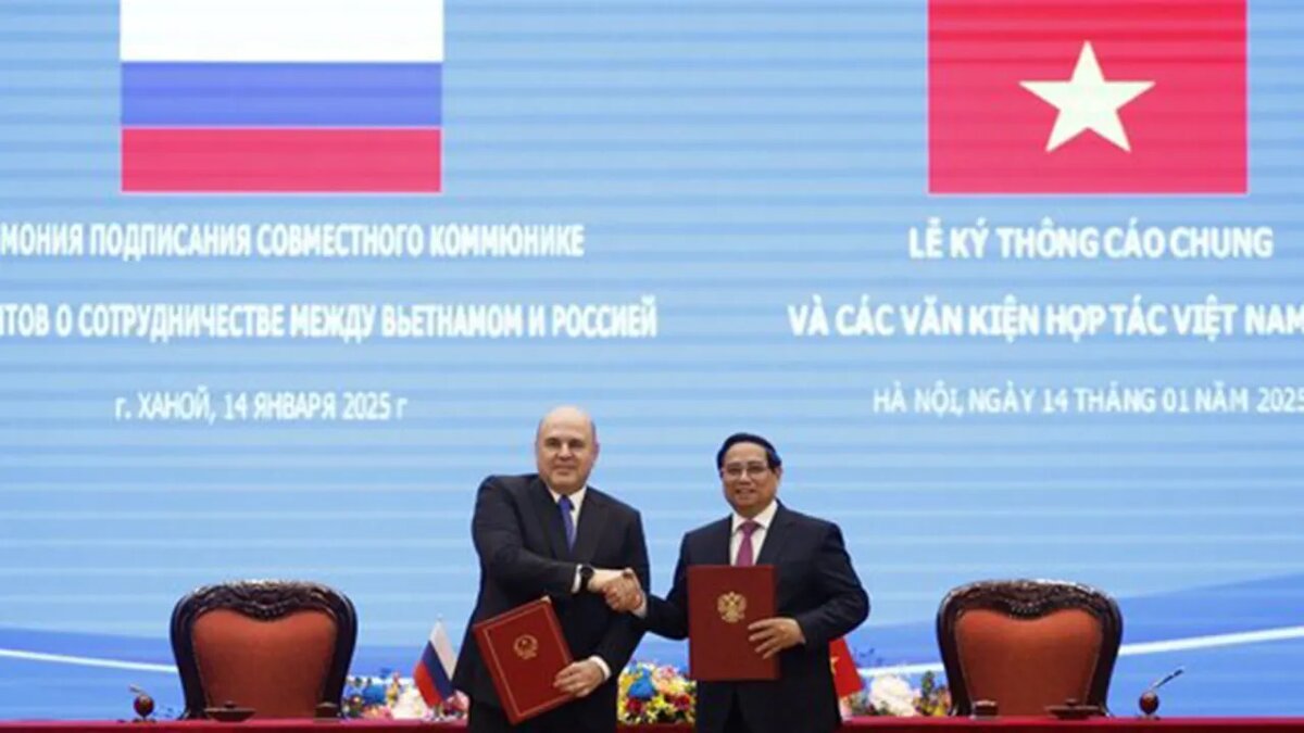    Михаил Мишустин и Фам Минь Тинь.