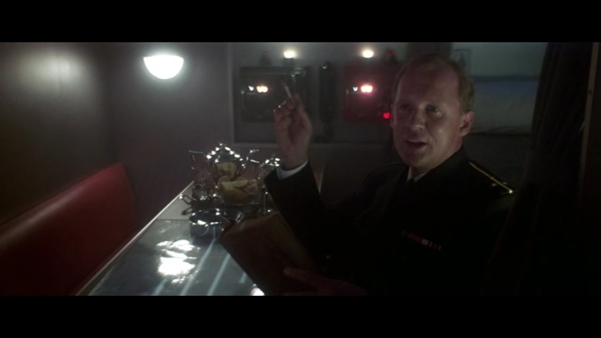 Старший лейтенант замполит Путин в каюте командира. Кадр из фильма