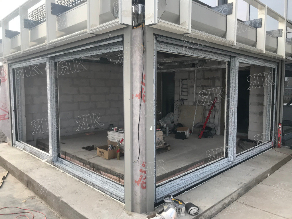 панорамные раздвижные окна SCHUCO ASE 80.HI на крыше дома