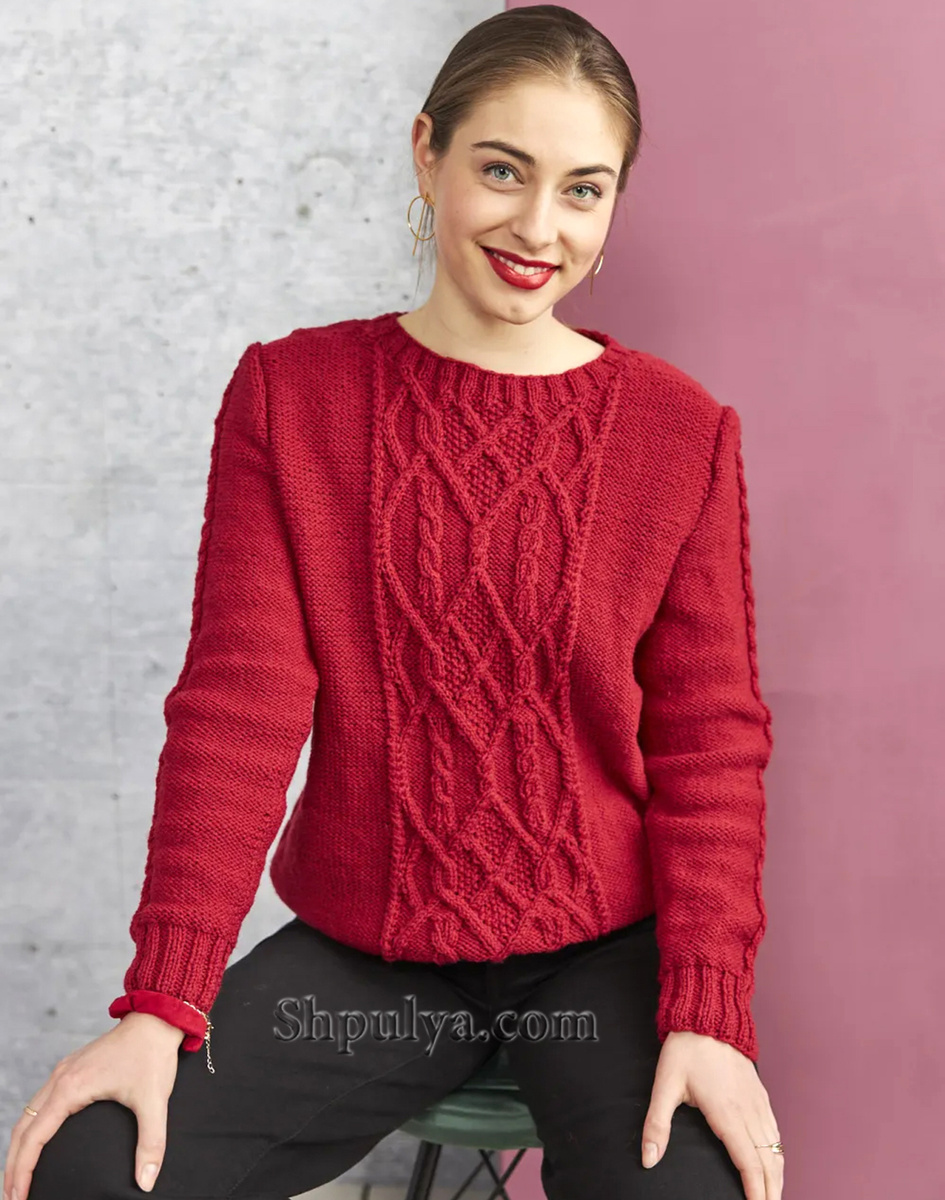Красный вязаный пуловер с «косами»