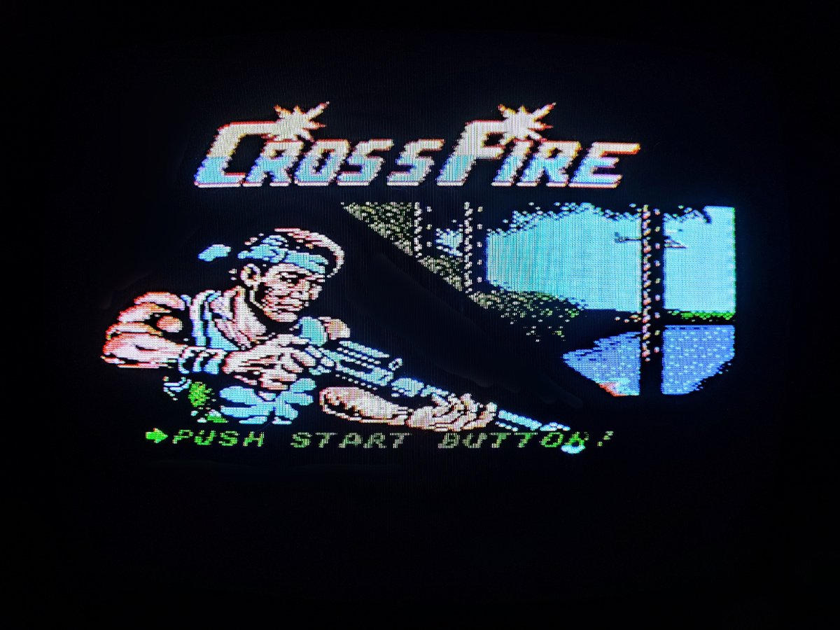 Фото сделаны мной. На фото игра "Cross Fire. Оригинал игры "Cross Fire" был разработан Sanritsu Denki и издан Kyugo Boueki. в 1990г. для Famicom. Фото демонстрирует начальную заставку игры, а так же общий визуальный фон игры. Подробнее об этом рассказано в статье. Все материалы принадлежат правообладателям и размещены исключительно в информационных целях.