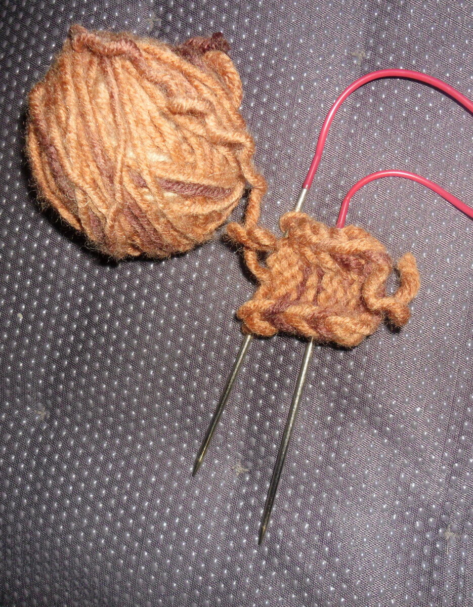 Связала спицами хвостик