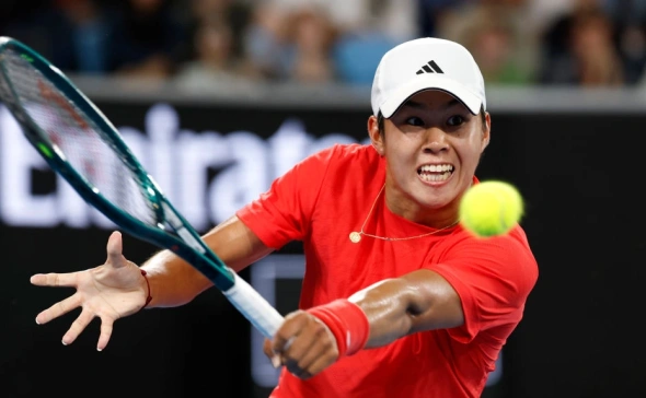 Американский теннисист Ленер Тьем в матче с Медведивым 