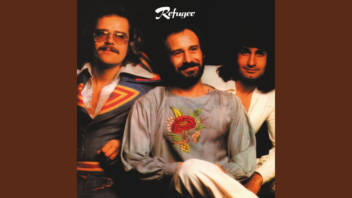 Refugee - справа Patrick Moraz