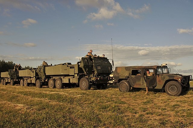    M142 High Mobility Artillery Rocket System (HIMARS) vehicles with the 1st Battalion, 623rd Field Artillery Regiment, Kentucky Army National Guard participating in Saber Strike 18 execute a fire mission at Bemoko Piskie, Poland, June 14, 2018. Saber Strike 18 facilitates cooperation between U.S., Estonian, Latvian, Lithuanian, Polish and other allied and partner nations to improve joint operational capability in a variety of missions. The exercise prepares the participating nations and its units for future operations while enhancing the NATO alliance. (U.S. Army photo by Charles Rosemond) Василий Соколов