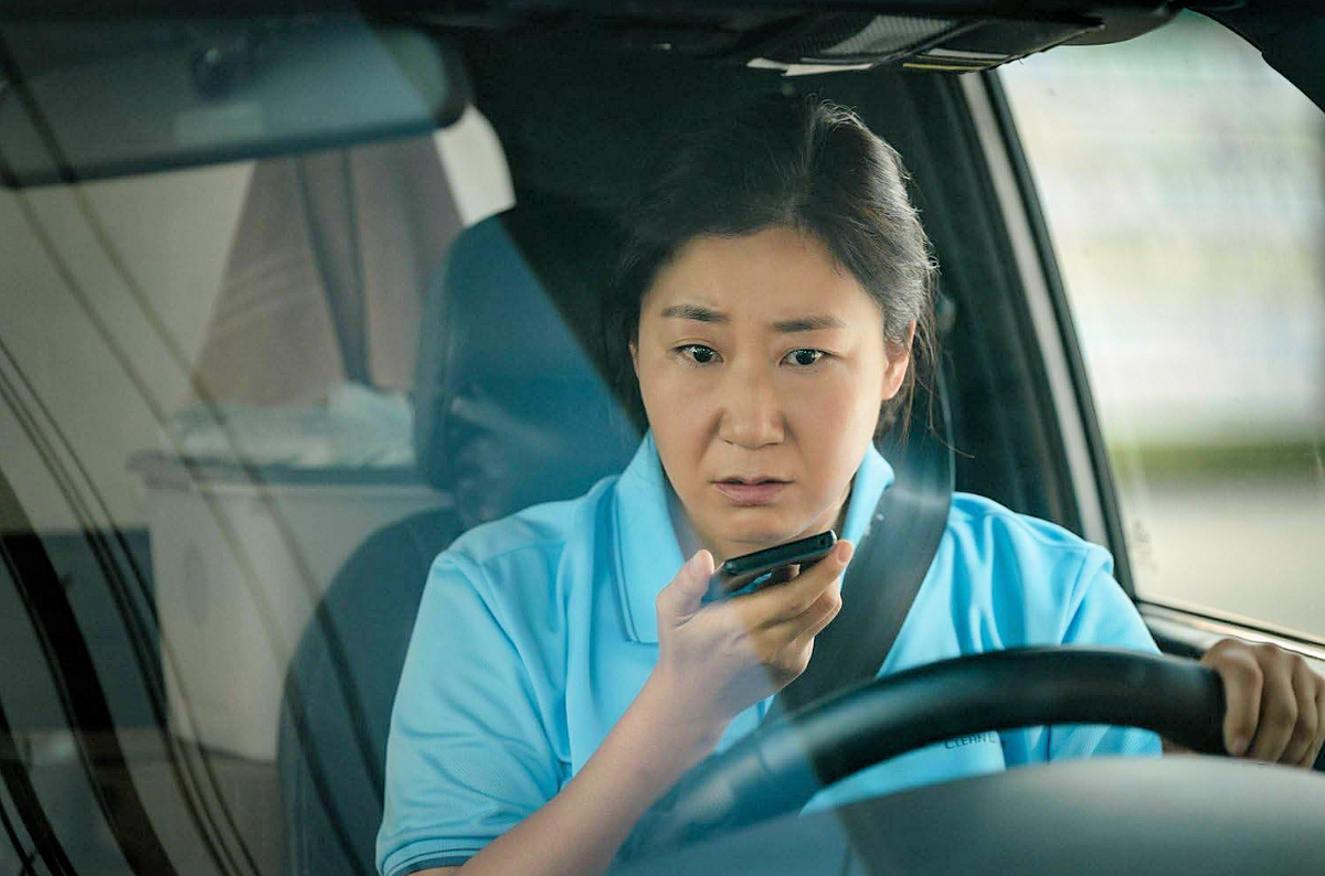 Ток-хи, главная героиня. Кадр из фильма «Телефонные мошенники» (2024)