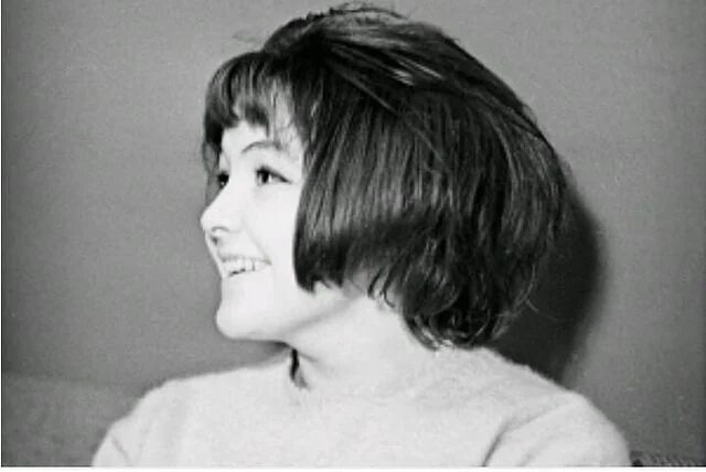 Белла в юности.