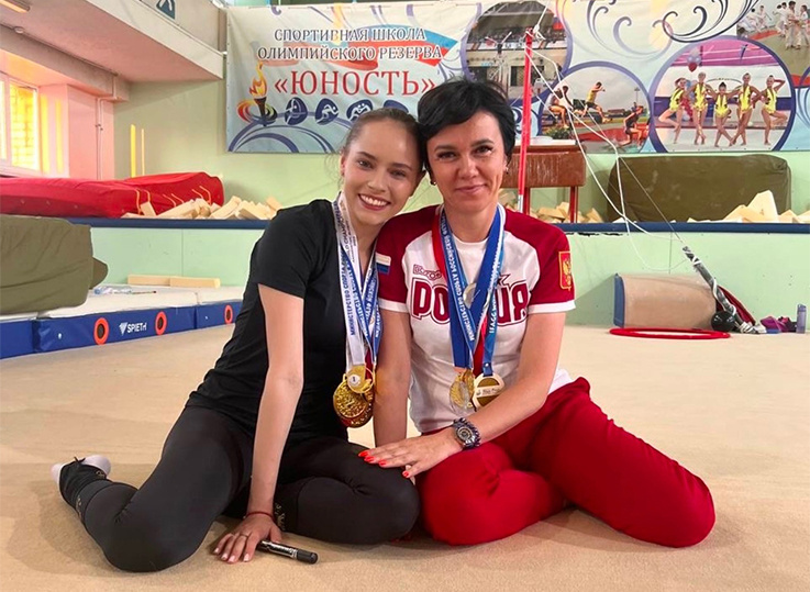 Полина с первым тренером Ириной Гусевой